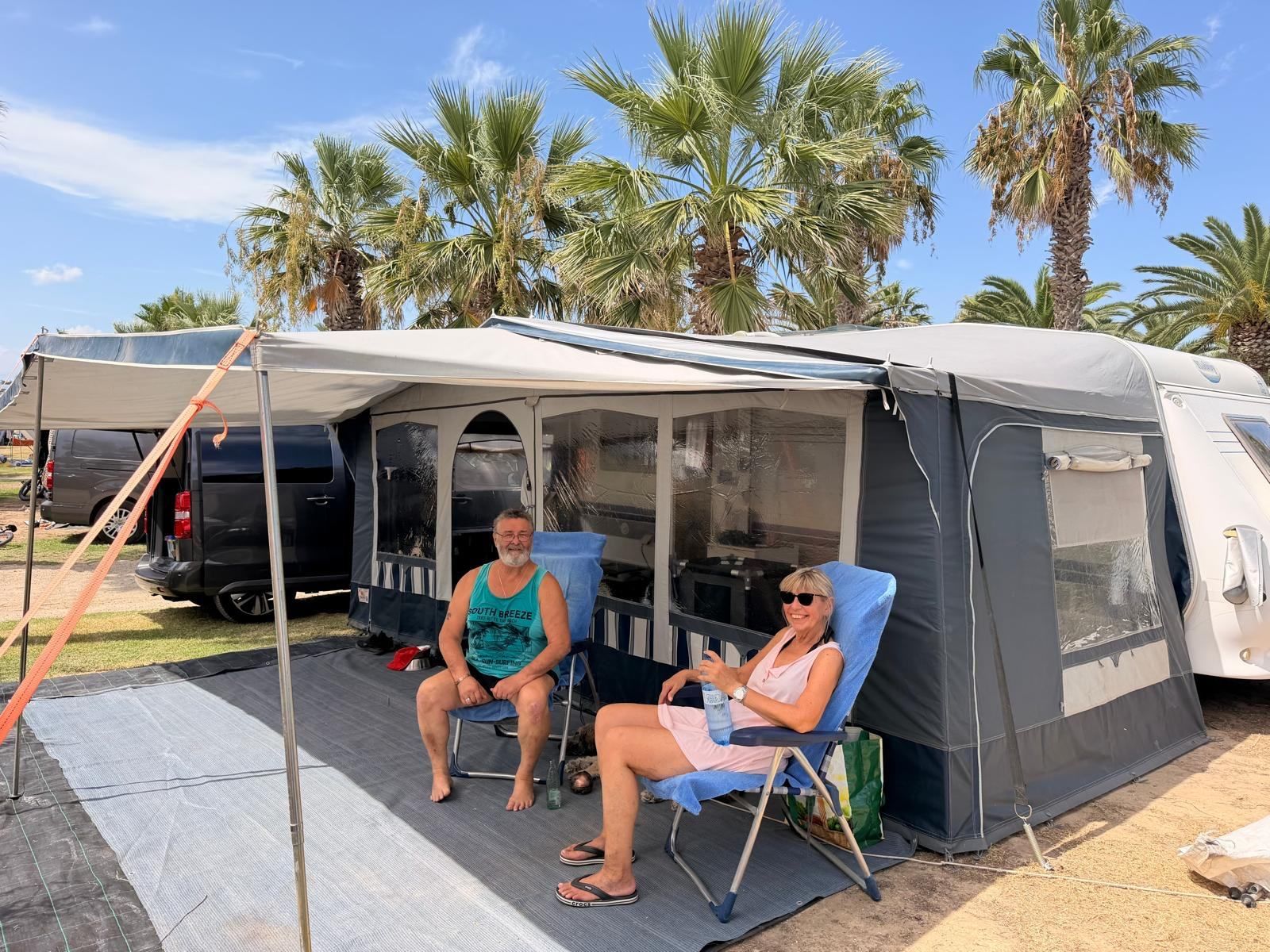Caravan with its awning up on a campsite pitch on the Costa Brava